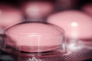 Pink Round Medication Pill
